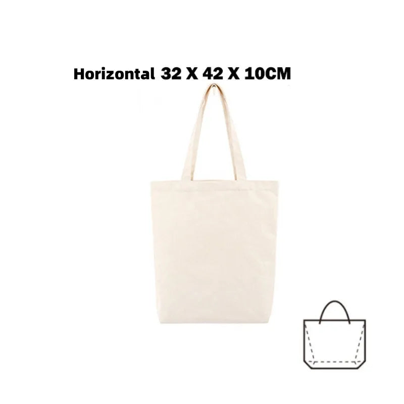 A light beige canvas tote bag with handles shown against a white background.
