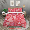 Pink heart patterned quilt cover and pillowcases with a white border