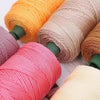 A collection of various colored 3mm ice rope crochet yarn spools in shades of orange, beige, pink, and brown.