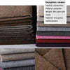 A stack of dark brown, gray, and purple coarse linen and cotton fabric rolls with encryption reinforcement features.