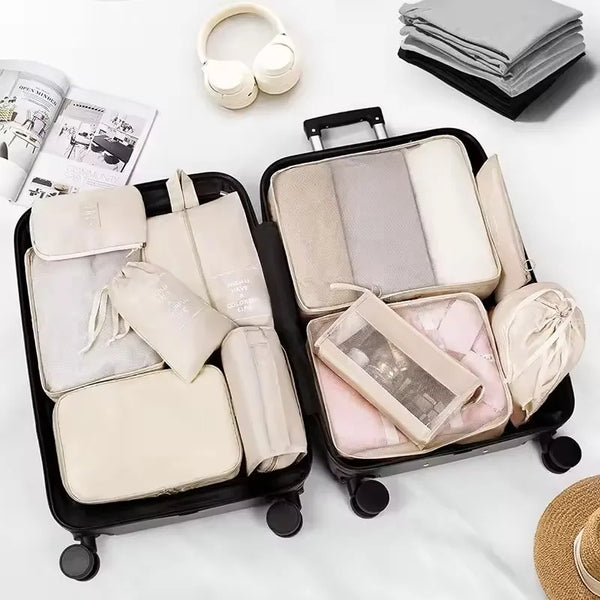 A black travel storage organizer set featuring multiple compartments and accessories for organized packing.