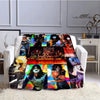 A printed flannel travel blanket featuring various dark fantasy and gothic themed designs.