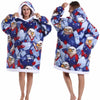 A woman models a blue and red patriotic patchwork fleece hoodie featuring eagle graphics.