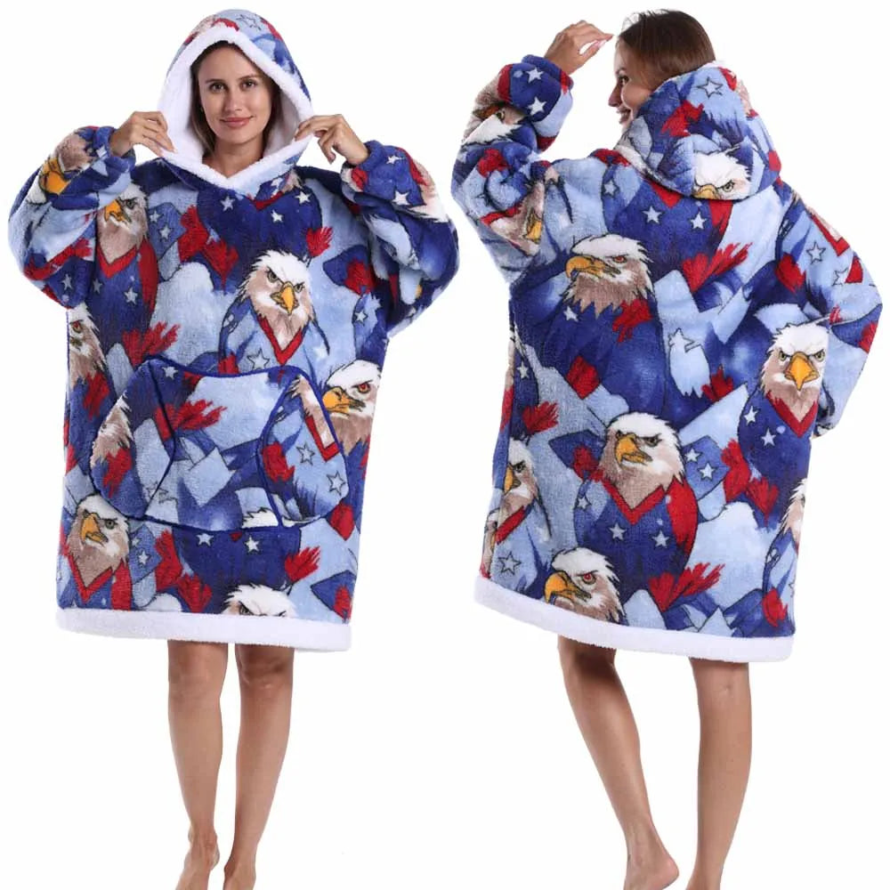 A woman models a blue and red patriotic patchwork fleece hoodie featuring eagle graphics.