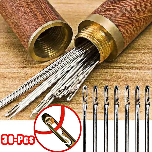 A set of 30 stainless steel blind sewing needles shown emerging from a wooden casing.