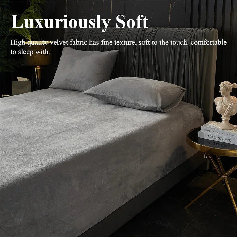A luxurious gray velvet bedding set featuring a sheet and pillows on a bed.