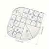 Acrylic quilting ruler with corner templates for sewing and patchwork showing various measurements and guides.