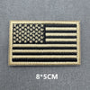A rectangular USA flag patch featuring stars and stripes with a gold embroidered border.