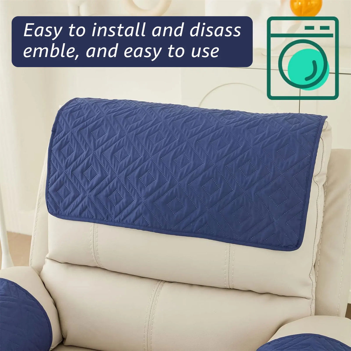 A navy blue quilted headrest protector cover is shown on a white recliner chair.