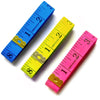 Two flexible fiberglass measuring tapes in blue and pink, showing markings up to 3 inches.