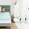 A woman is sitting on a teal memory foam mattress topper with various sizes displayed for choice.