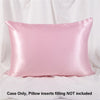 A smooth pink satin pillowcase is shown lying flat against a white background.