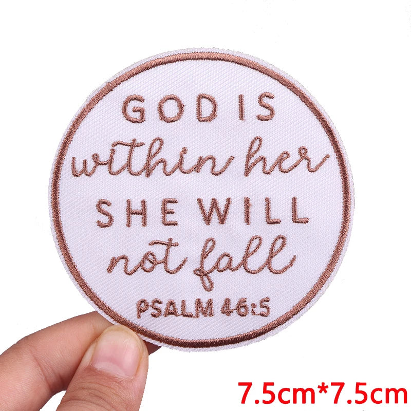 Pink letter embroidered iron-on patch with the text God is within her she will not fall Psalm 46:5