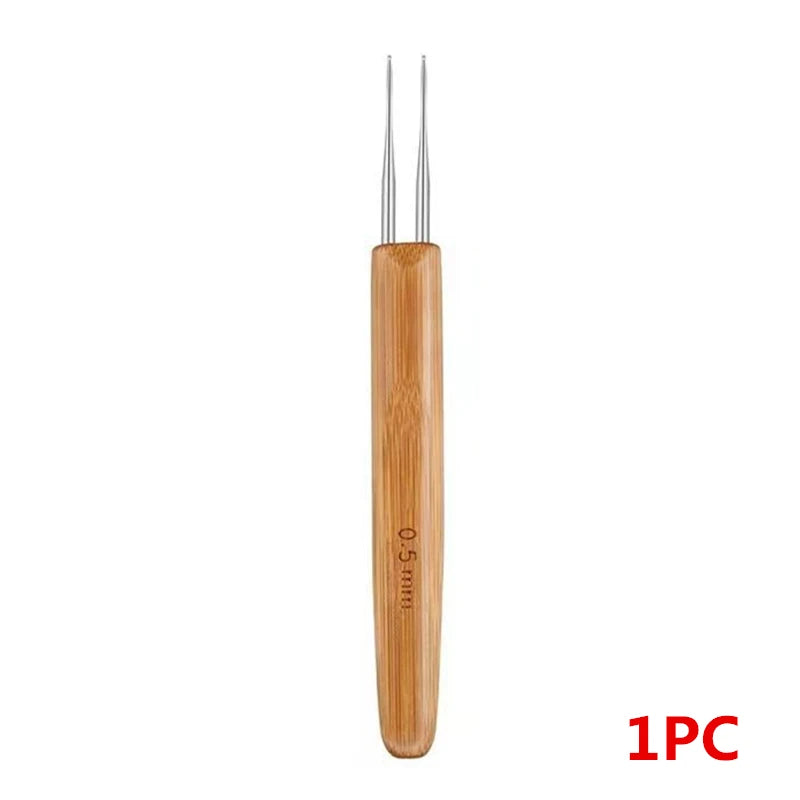 A single wooden precision crochet hook with sharp metal tips.