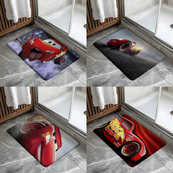 A set of cartoon anti-slip door mats featuring various red and yellow car designs placed in a wooden frame.