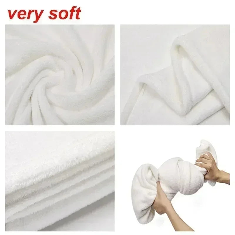 A close-up of a very soft white flannel throw blanket being rolled and shown in various textures.