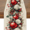 Christmas pine cone and red berry linen table runner featuring ornaments and greenery