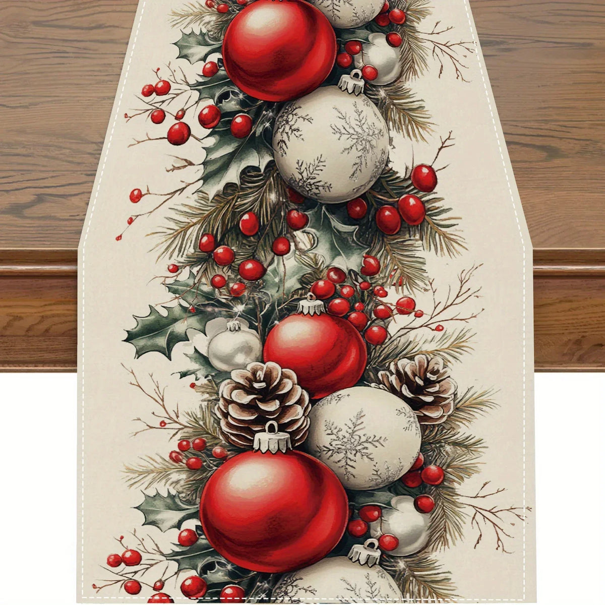 Christmas pine cone and red berry linen table runner featuring ornaments and greenery