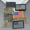 A collection of USA flag tactical reflective patches with hook and loop backing in various designs and colors.