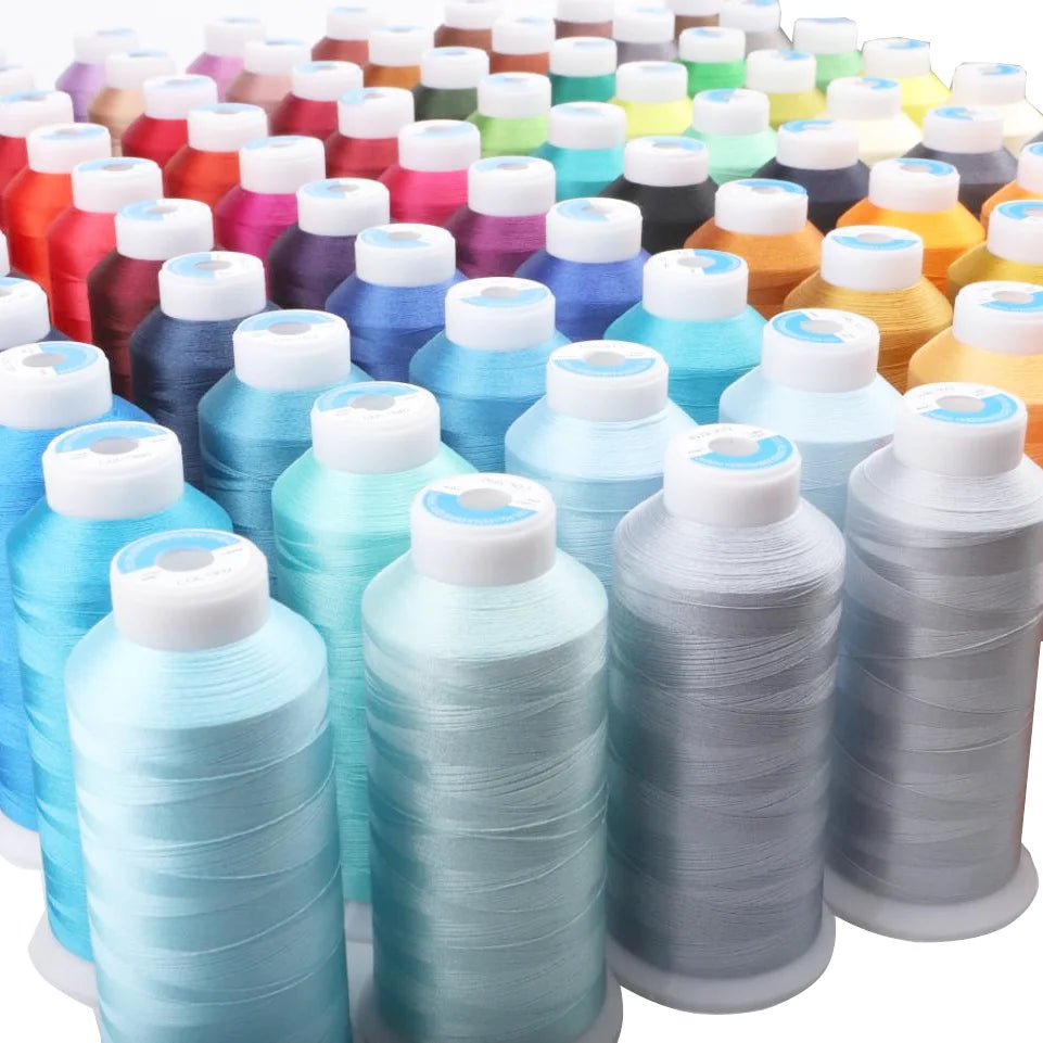 Bulk roll of light blue polyester embroidery thread in various colors and shades