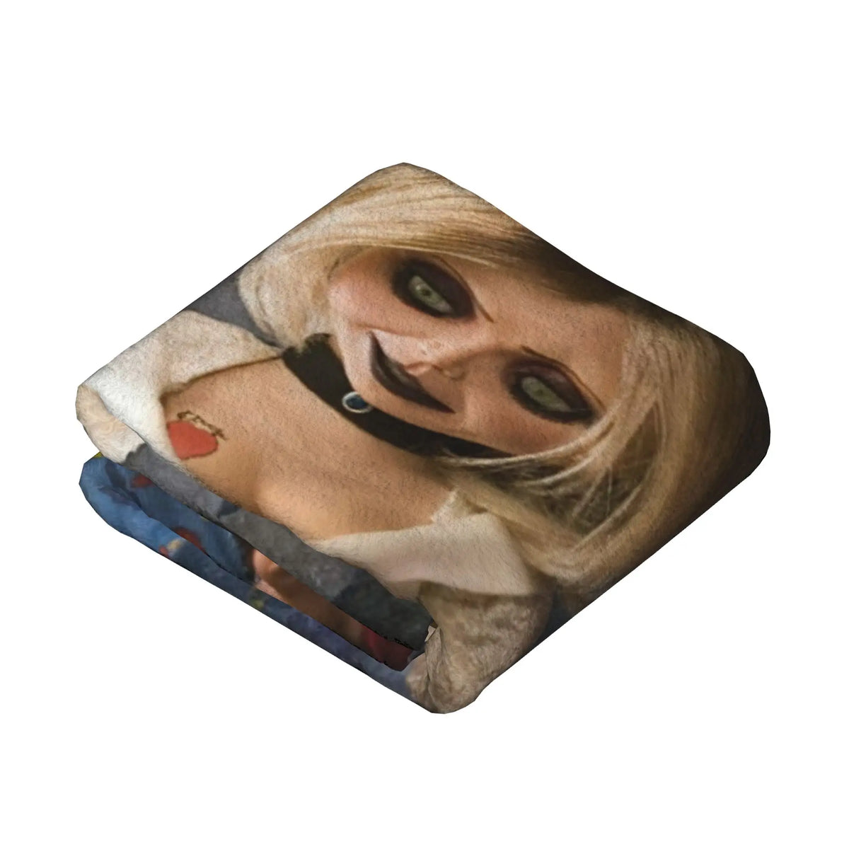 A flannel throw blanket featuring a graphic design of Chucky from the horror movie franchise.