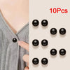Ten black pearl button pins are displayed against a light background.