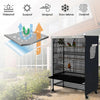 A black bird cage with a transparent night cover is shown outdoors, demonstrating waterproof and windproof protection.