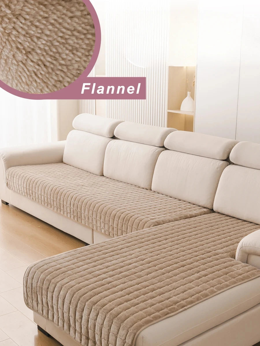A beige flannel sofa cover featuring a quilted texture on an L-shaped corner sofa in a bright room.