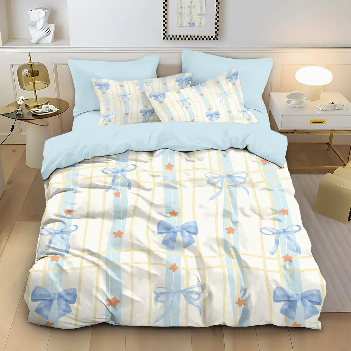 A light blue duvet cover set featuring a pattern of pink and blue bows on a white background.