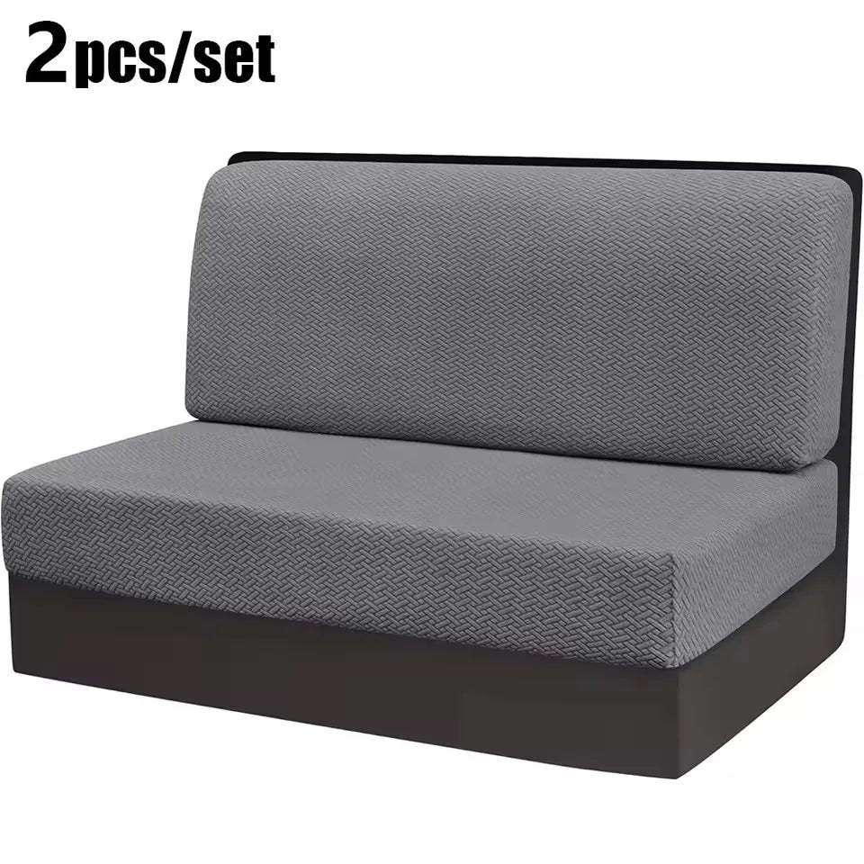 A pair of gray stretch jacquard seat covers for vehicle upholstery shown flat.