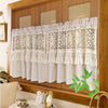 Geometric lace short curtains in beige hanging on a wooden frame