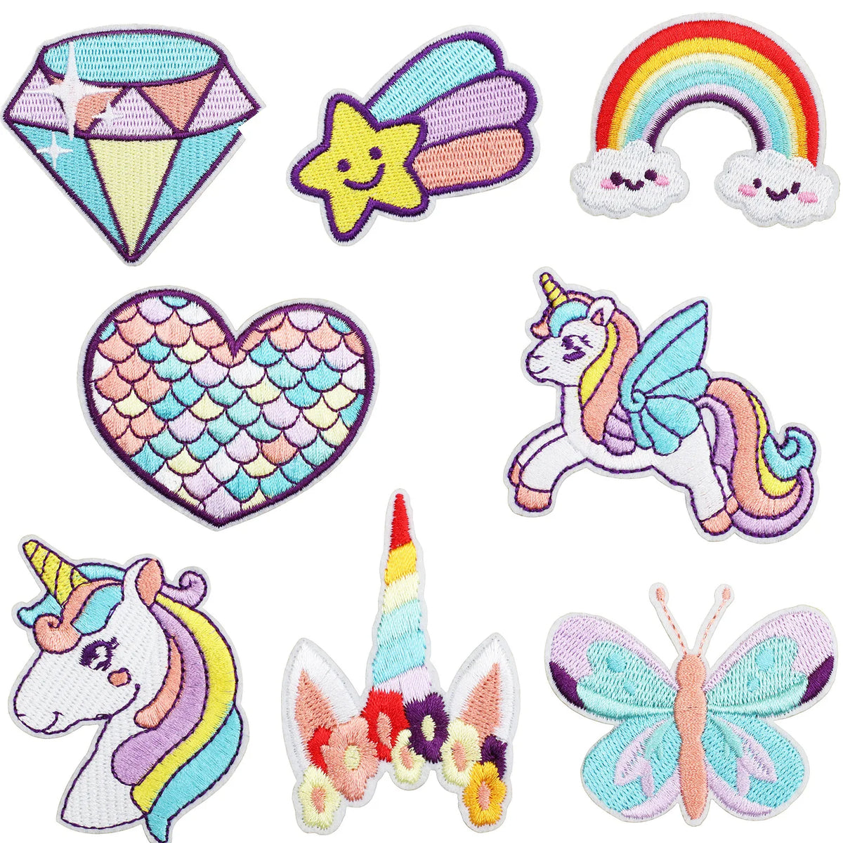 A collection of embroidered patches featuring unicorns and butterflies in various colors like purple, yellow, pink, and blue.