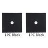 Two square black stove burner protector mats with a circular hole each