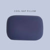 A smooth, dark blue memory foam neck and travel pillow.