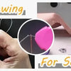 Hands demonstrate using a precision needle threader set for hand sewing and sewing machine work.