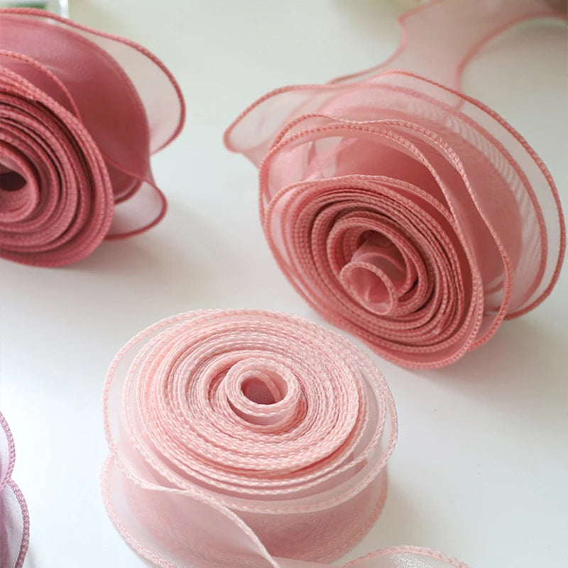 Pink silky organza ribbon rolls for gift wrapping and crafts