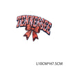 Iron-on embroidered letter patch spelling out TENNESSEE with a peach colored bow