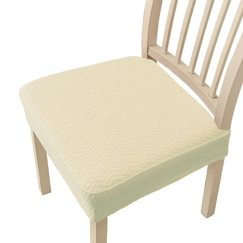A light beige fabric seat cover for a wooden bar or dining chair.