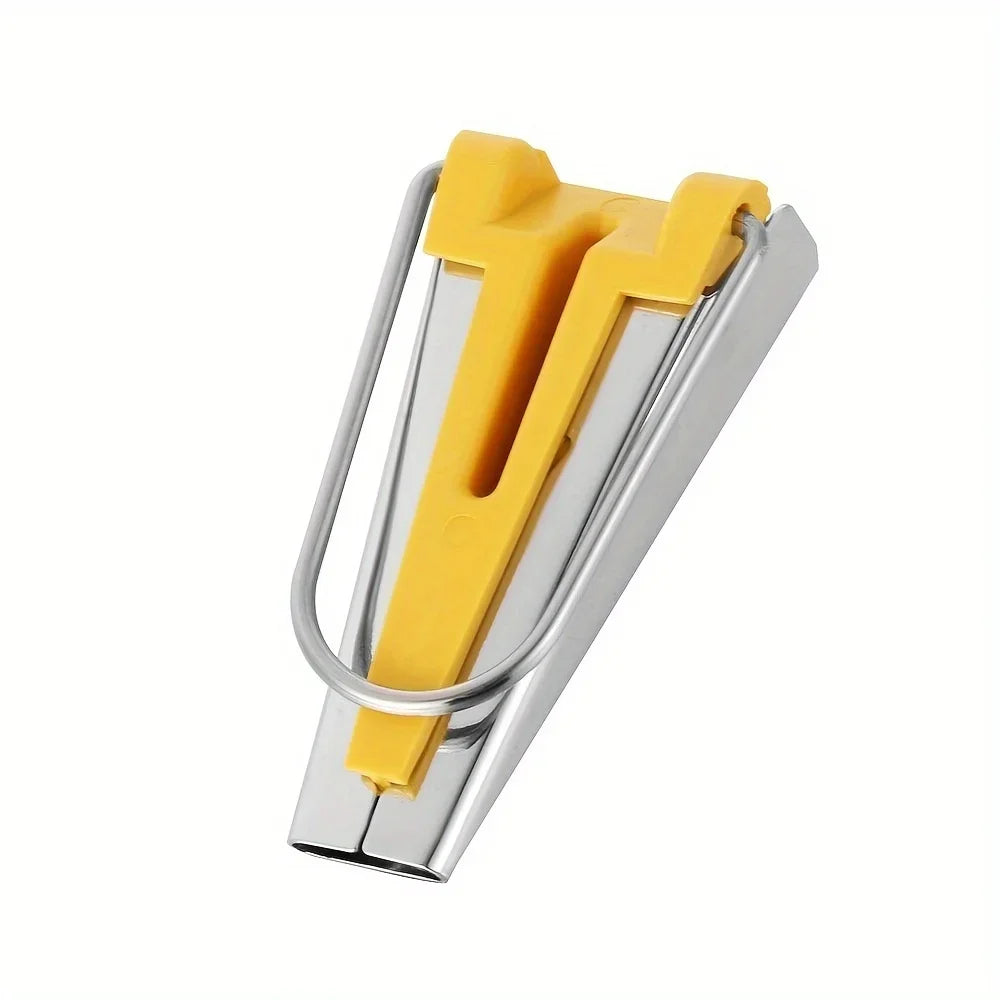 A silver bias tape maker set with a yellow awl tool for sewing and quilting.