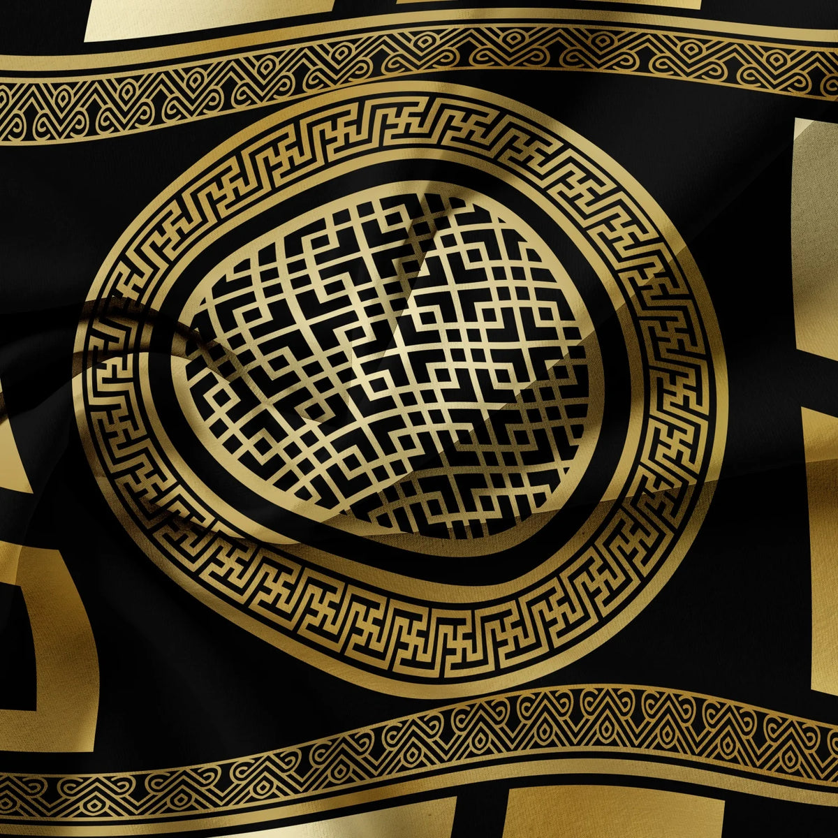 A black fabric with intricate gold geometric patterns and borders.