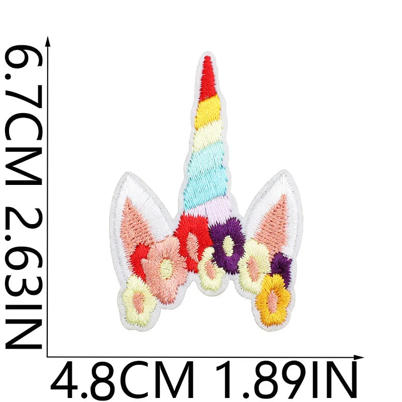 Unicorn butterfly embroidery cloth patch featuring pastel rainbow colors and pink accents