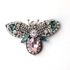 Handmade bee beaded sew-on patch featuring iridescent pink and green sequins and rhinestones