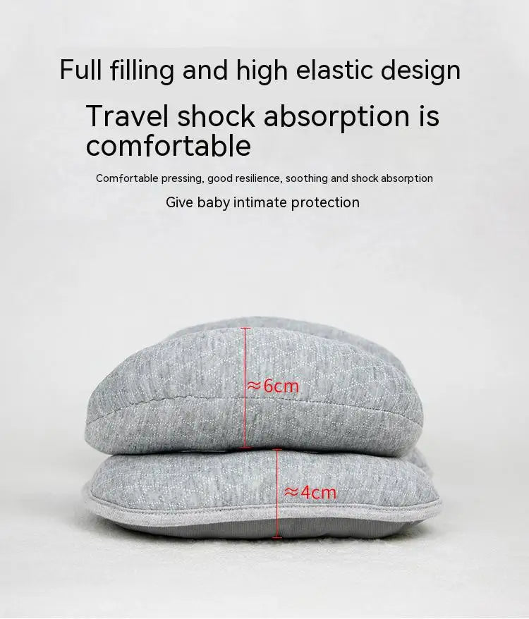 Gray baby head and neck support pillow shown with measurements of 6cm and 4cm