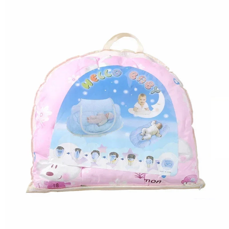 Pink portable baby crib net with soft padding featuring a moon and baby illustration