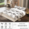 A luxury 3-piece comforter set featuring a light gray and white patterned duvet cover displayed on a bed.