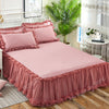 Pink princess lace bed skirt set with pink bedding and white decor