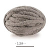 A ball of gray, extra thick hand-knitted yarn for crafting and gifts.