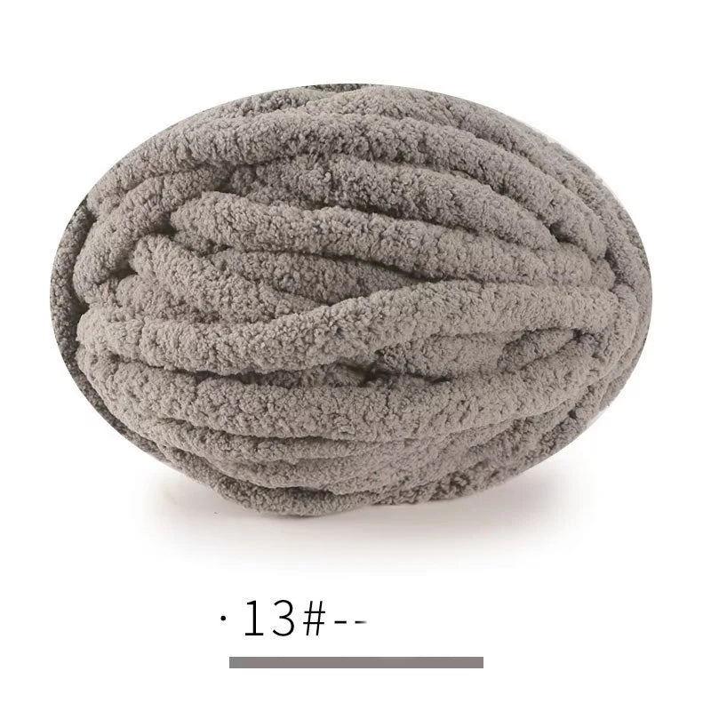 A ball of gray, extra thick hand-knitted yarn for crafting and gifts.