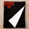A black knitted throw blanket featuring a red cross design on the upper left corner.