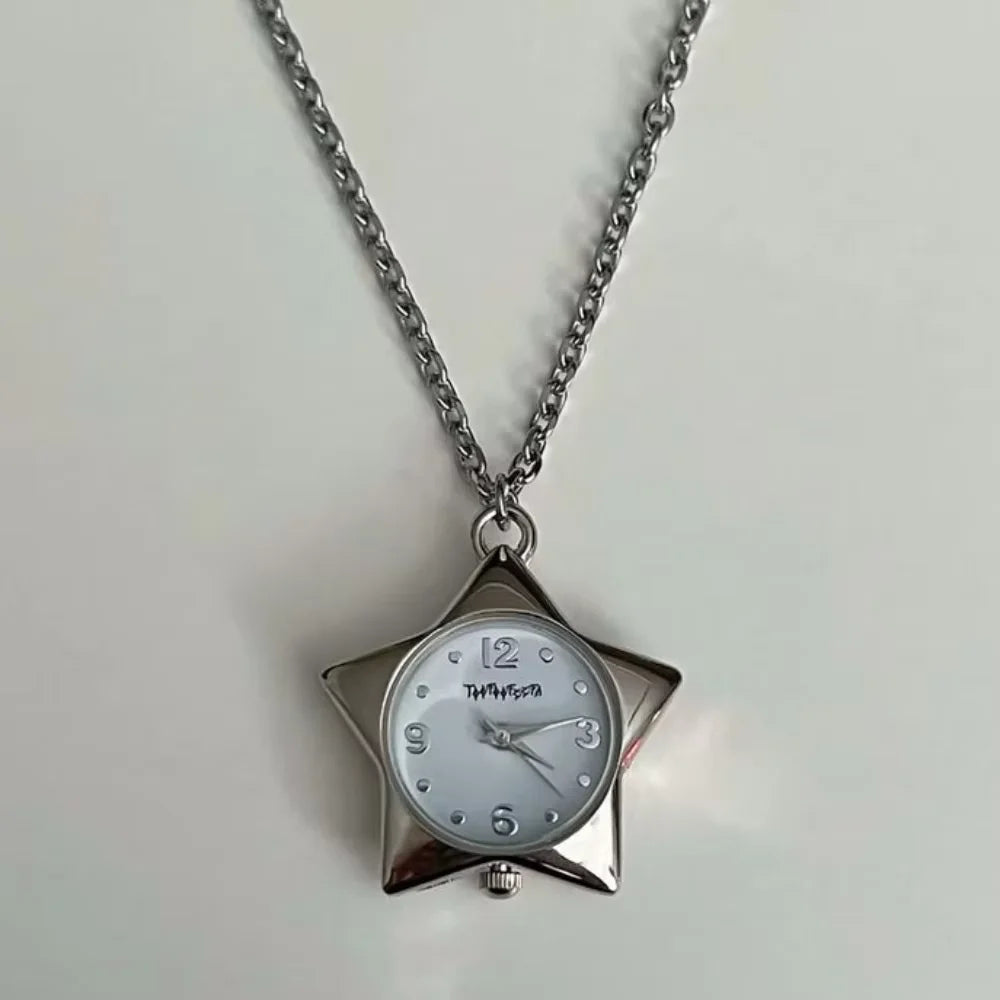 Silver chain necklace with a star-shaped pocket watch pendant displaying the time.